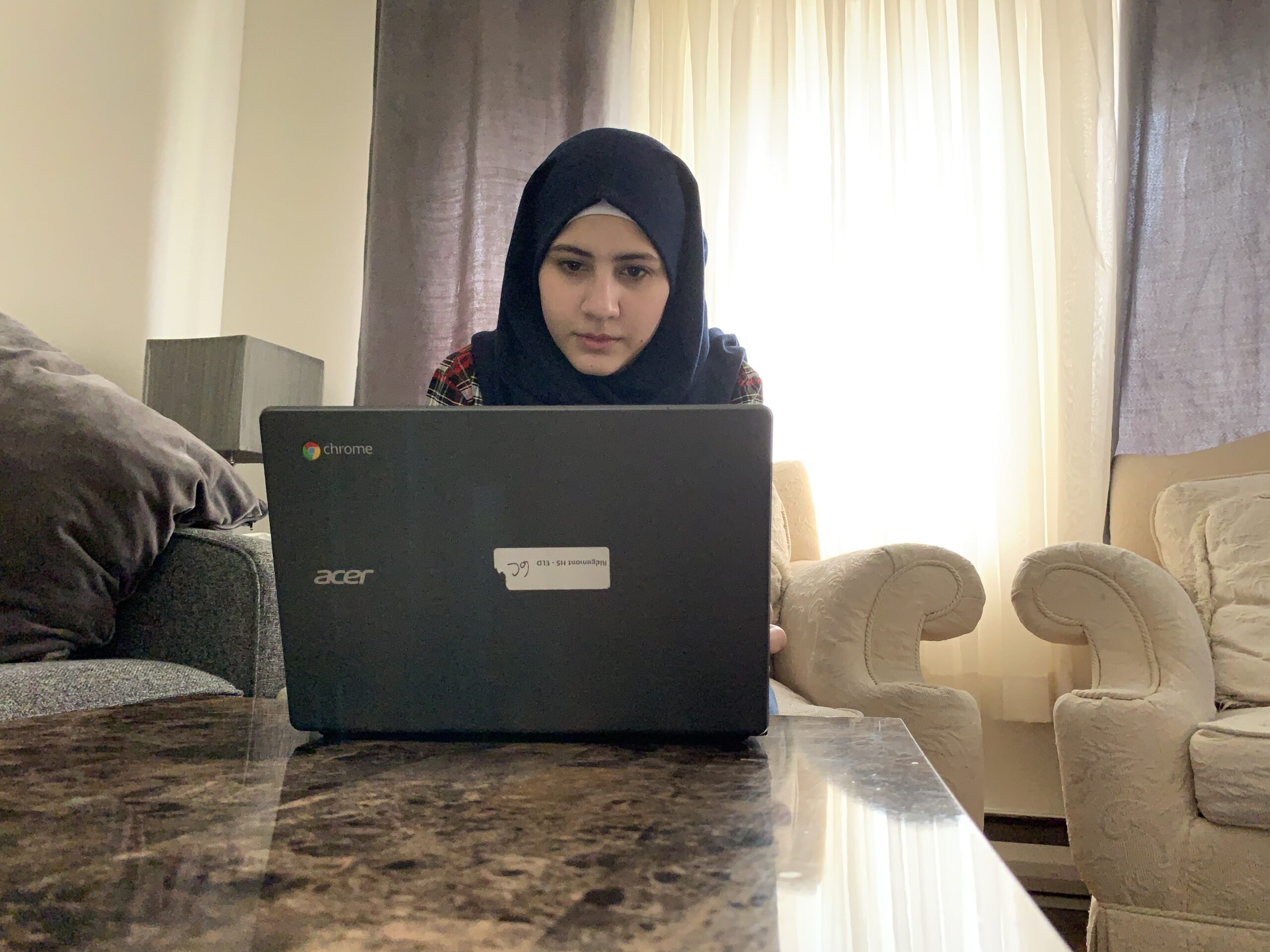 Aya Abou Rshd, refugee continuing education from home due to Covid-19