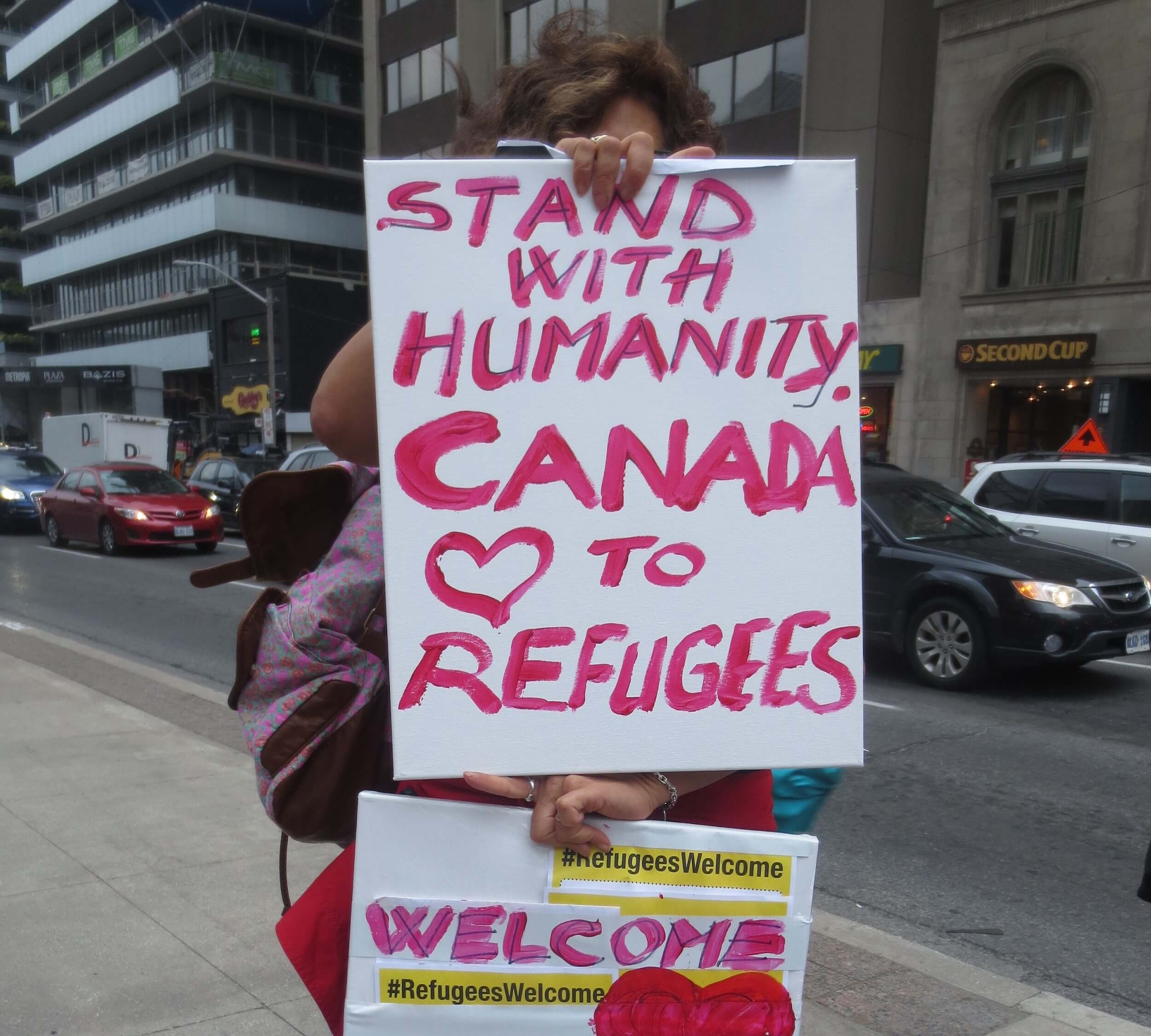 Sign from pro-refugee demonstration hosted by No One Is Illegal in 2016