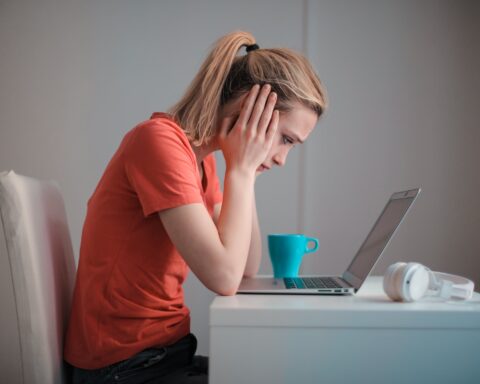 woman in front of computer, woman stressed