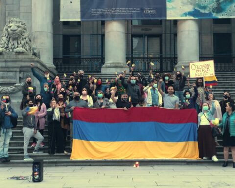 Activists pose for photo for Colombia