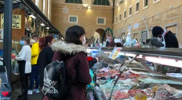 People shopping at a central market