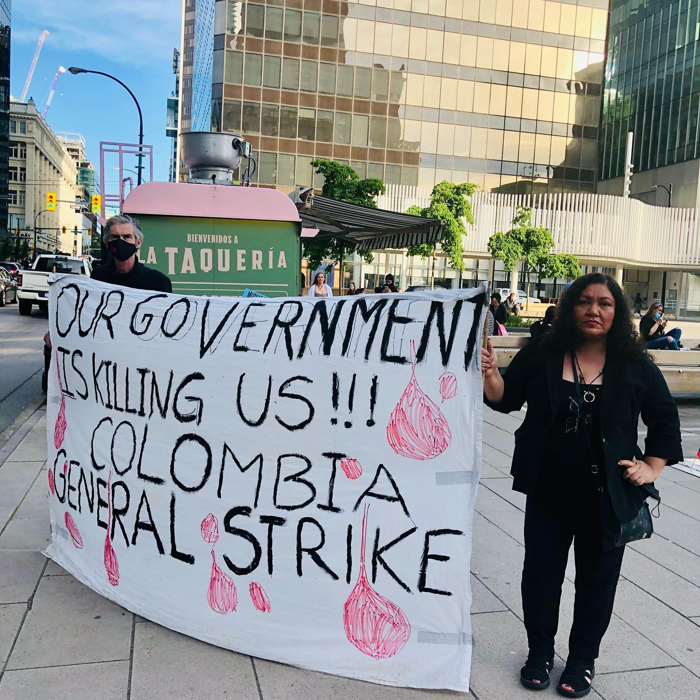 Activists holding a banner