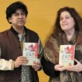 Canadian Bengali, Subrata Kumar Das, and poet Anne Michaels holding Das' book on Canadian literature in Bengali.