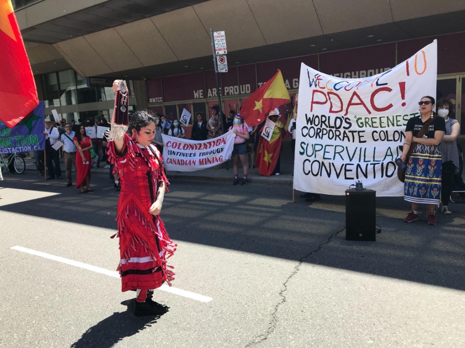 Protestor at Toronto's PDAC conference