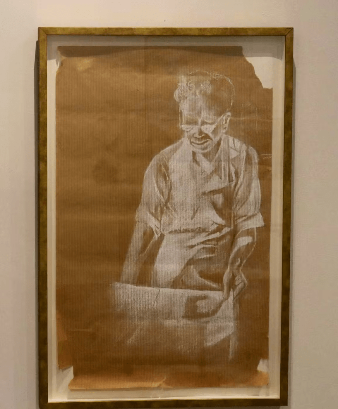 JJ Lee's drawing on a piece of brown paper left by her grandfather. It's based on a photo of her grandfather, Wing Lee, a chinese immigrant