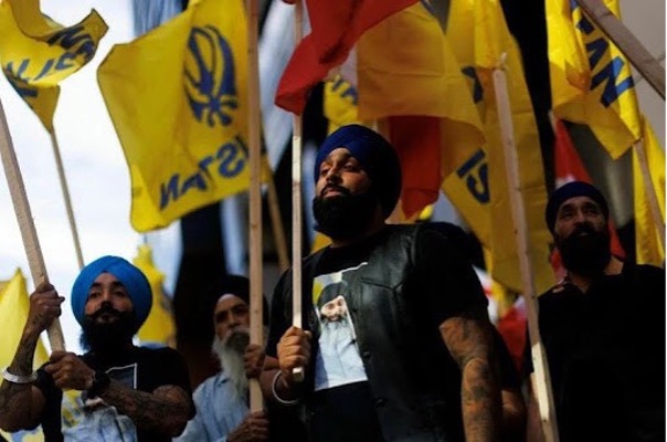 Inderjeet Singh Gosal, centre, among Sikh activists warned by RCMP of a potential threat over his activism. (Sikhs for Justice)