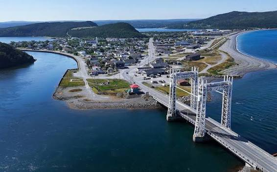 Aerial view of Placentia, Newfoundland and Labrador, showing the town's waterfront, harbour and the elevated bridge crossing the Gut that connects Placentia and Jerseyside.