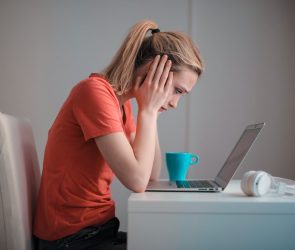 woman in front of computer, woman stressed